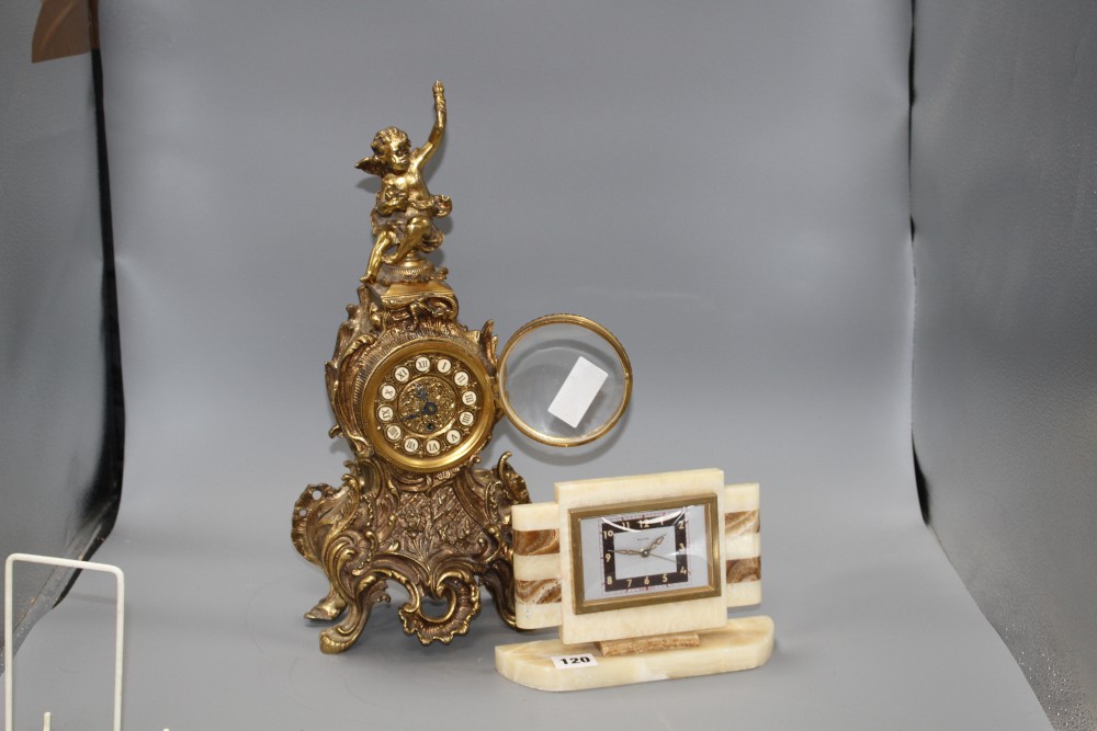 A Bayard two colour onyx mantel timepiece, height 15cm and a gilt metal mantel timepiece, height 42cm